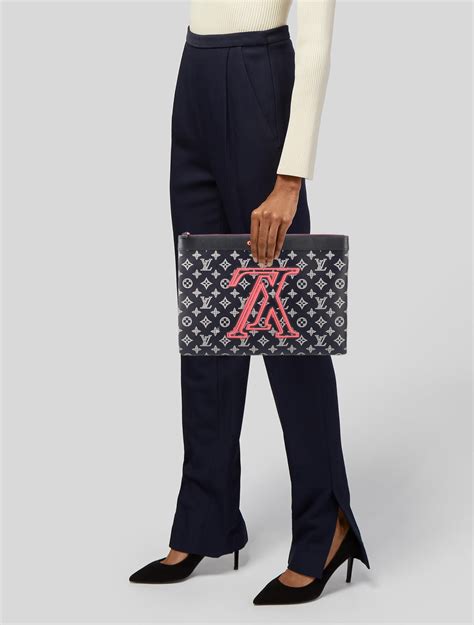 Louis Vuitton Monogram Upside Down Ink Pochette .